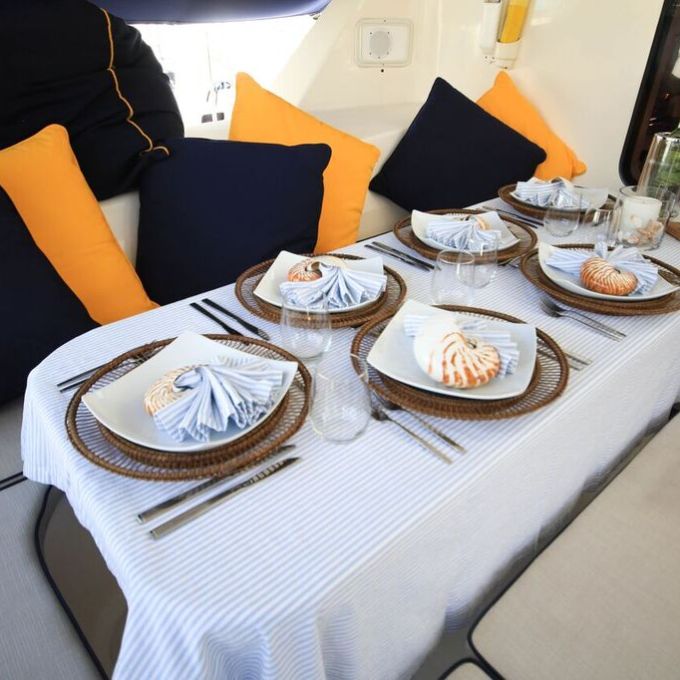 catamaran dining room set with wine and placemats
