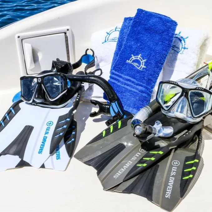 snorkeling gear and towels