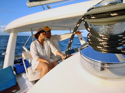 couple on Bellaventuras catamaran on the water