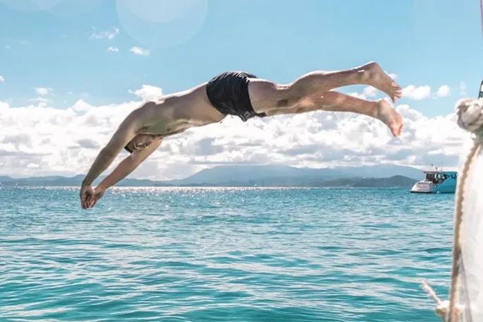 a person swimming in the water