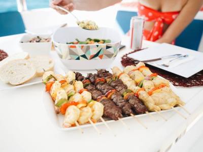 a white plate topped with different types of food on a table